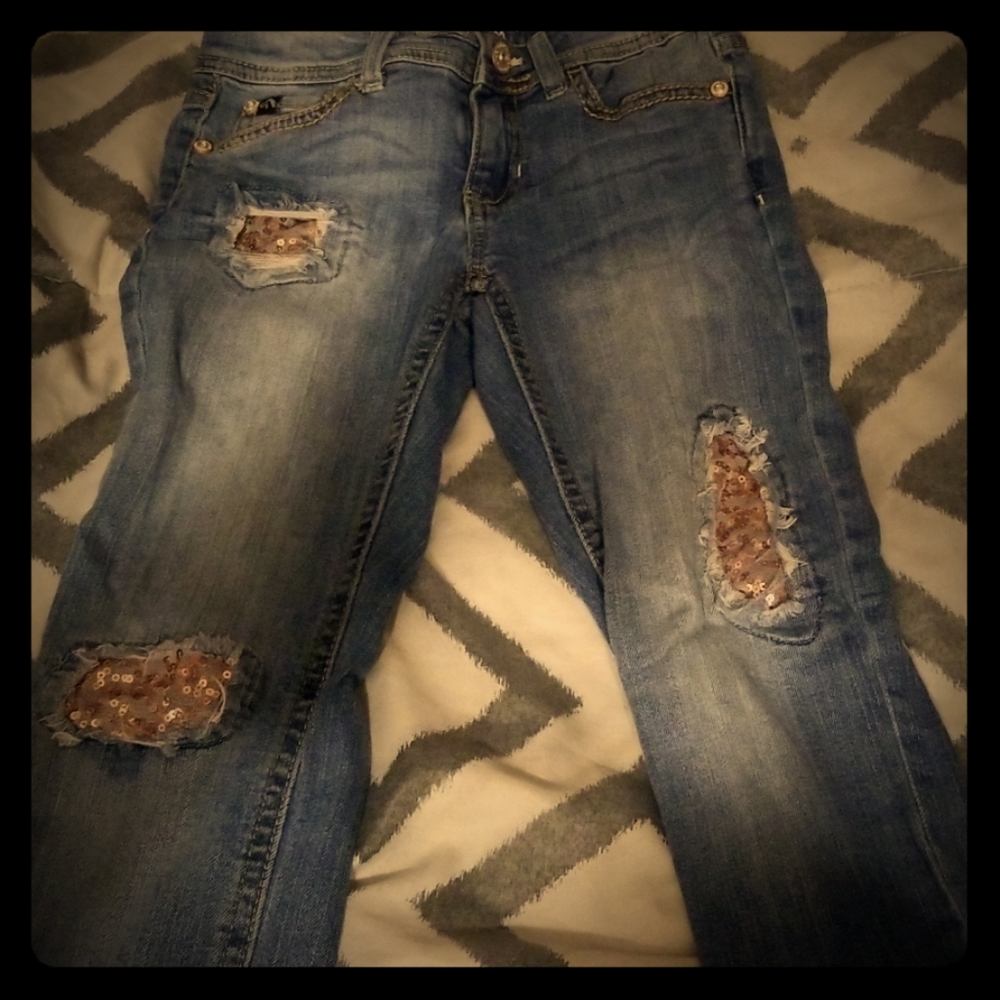 ripped blue jeans